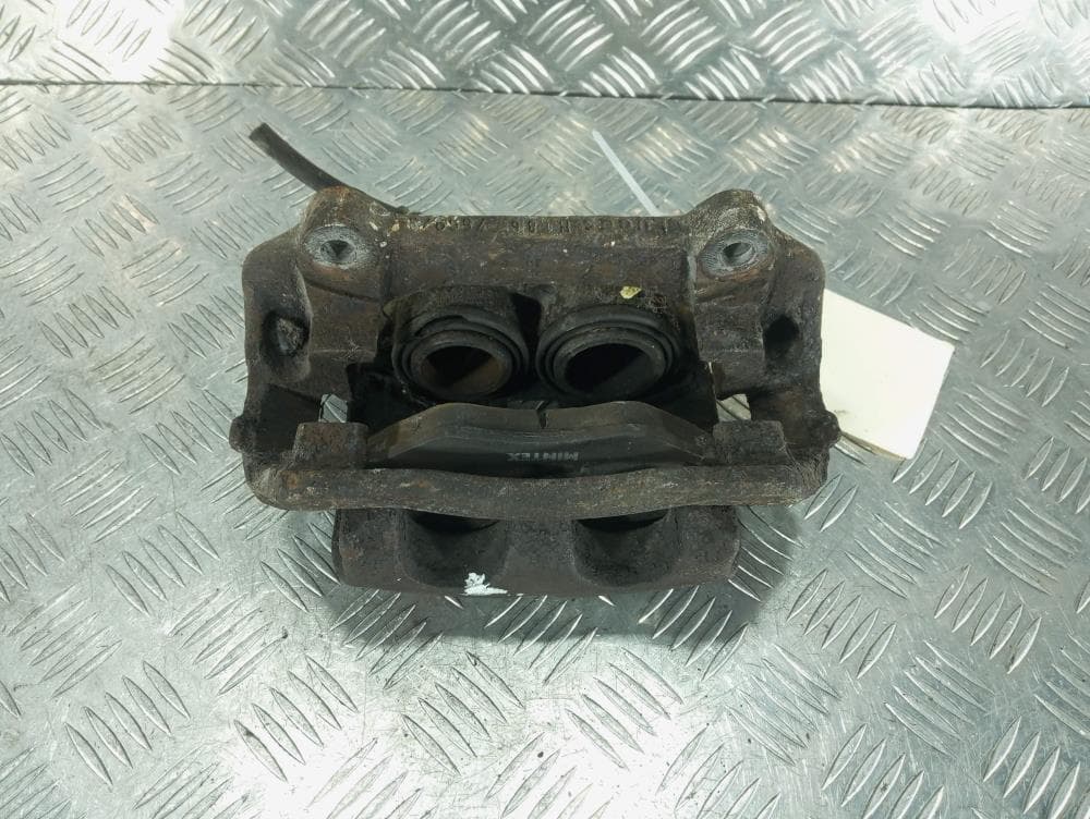 Суппорт передний левый к Renault Trafic 2 (01-06)