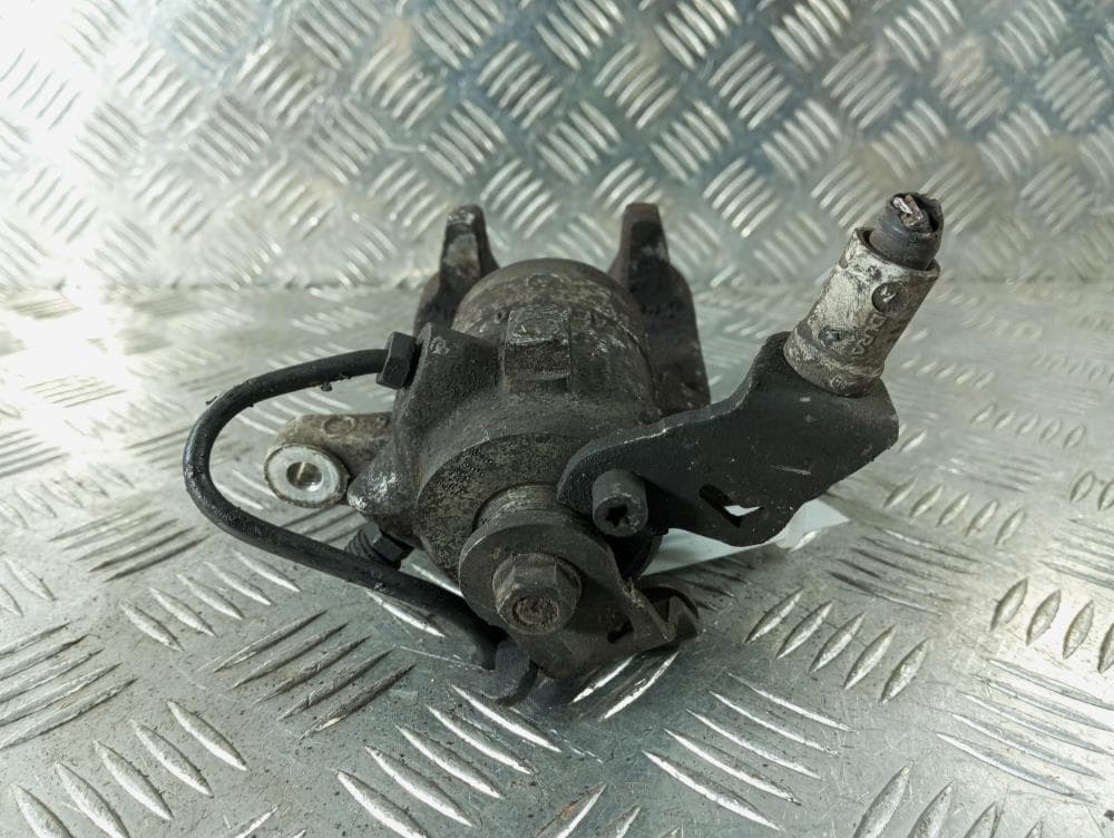 Суппорт задний левый к Citroen C4 1 (04-08)