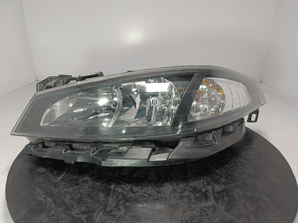 Фара левая к Renault Laguna 2 (01-05)