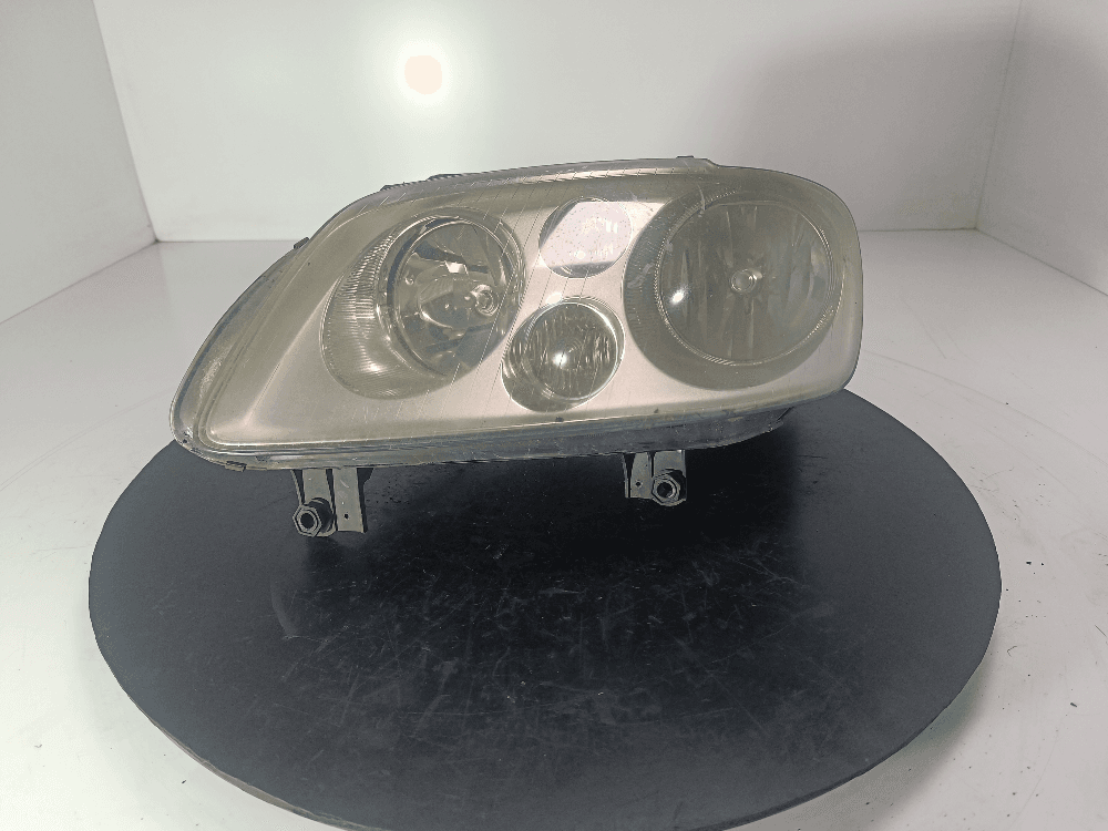 Фара левая к Volkswagen Touran 1 (03-07)