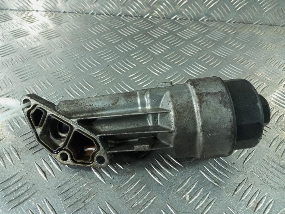 Корпус масляного фильтра к Opel Astra H (04-07)