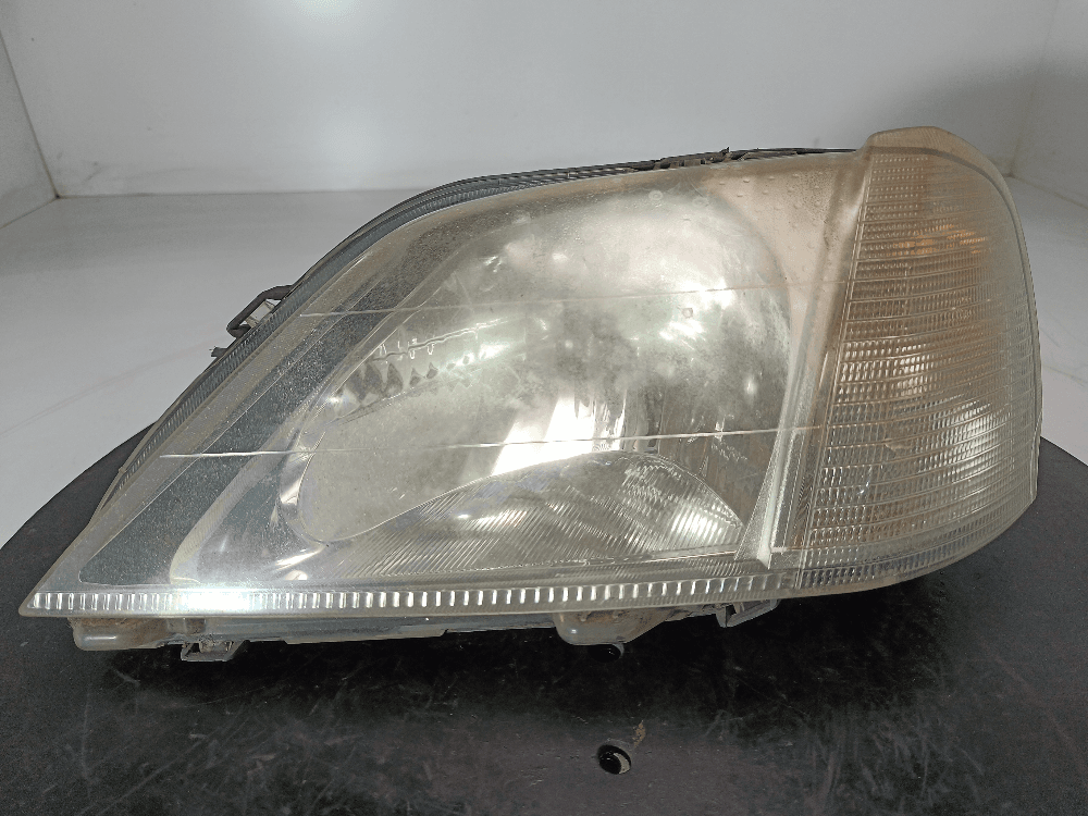 Фара левая к Renault Logan 1 (04-09)
