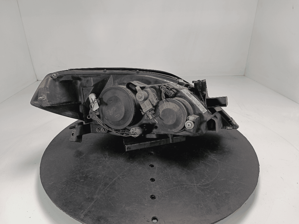 Фара левая к Nissan  Primera P12 (02-08)