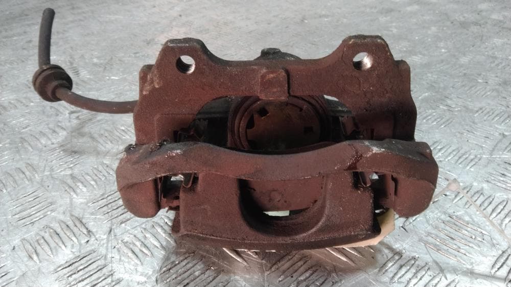 Суппорт передний левый к Fiat Stilo (01-10)