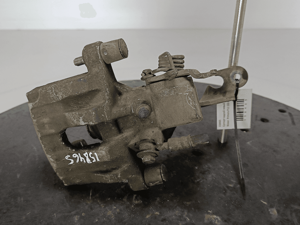 Суппорт задний левый к Nissan  Primera P12 (02-08)