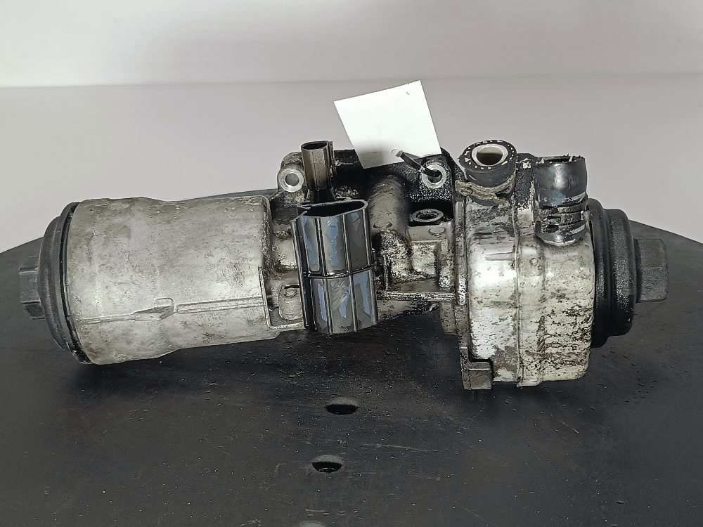 Корпус масляного фильтра к Volkswagen Golf 5 (03-09)