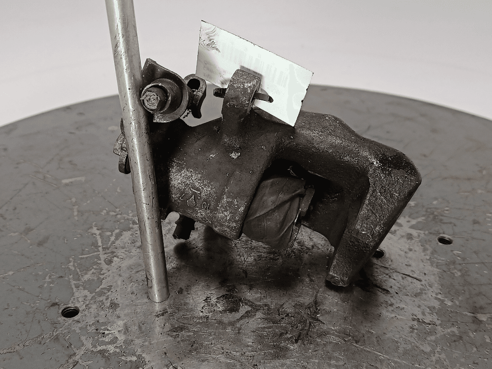 Суппорт задний правый к Opel Astra G (98-04)