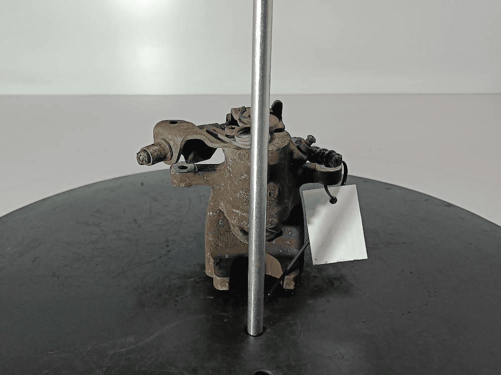 Суппорт задний левый к Opel Astra G (98-04)