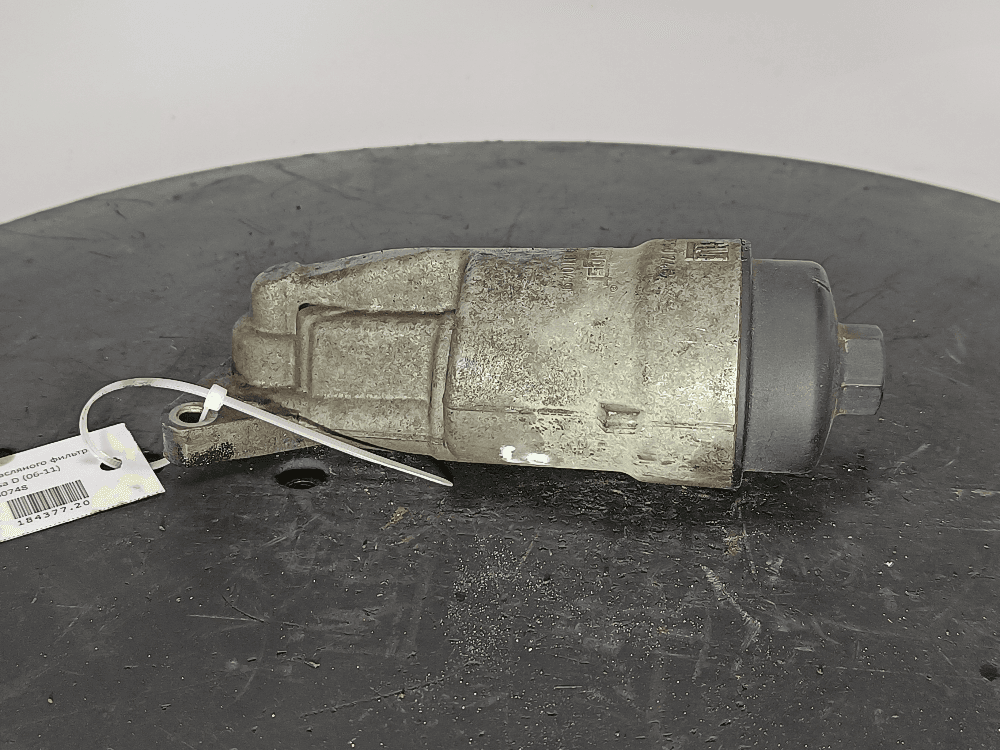 Корпус масляного фильтра к Opel Corsa D (06-11)