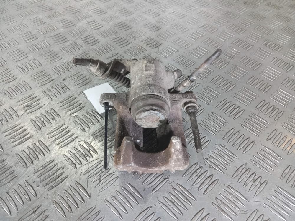 Суппорт задний левый к Volkswagen Golf 4 (97-06)