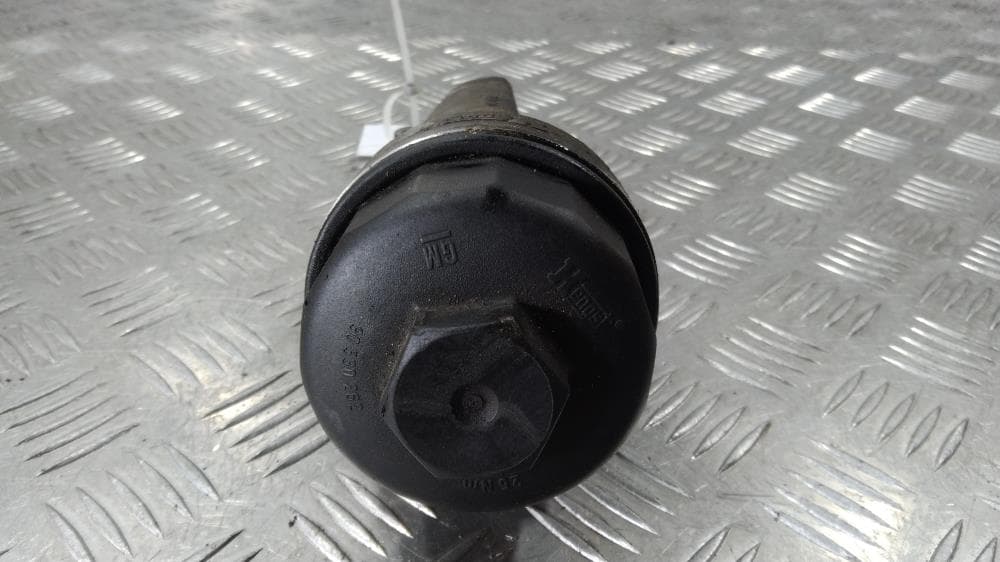 Корпус масляного фильтра к Opel Corsa D (06-11)