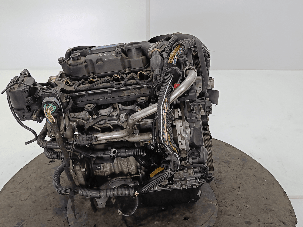 Двигатель к Peugeot 206 1 Рестайлинг (02-09)
