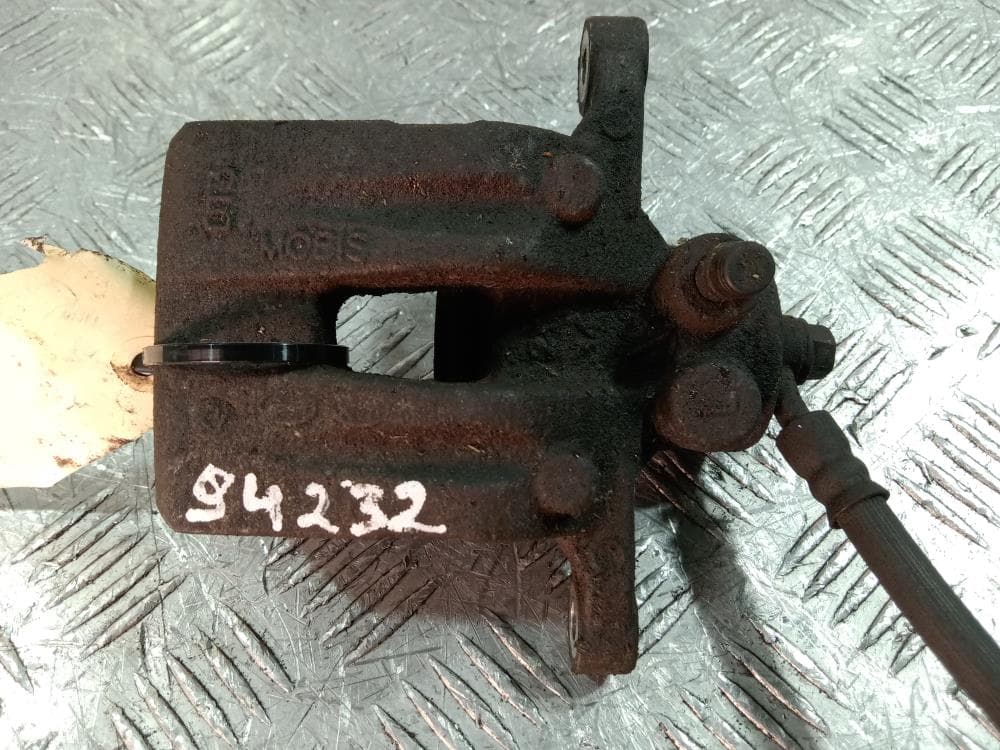 Суппорт задний левый к Hyundai ix35 1 (10-13)