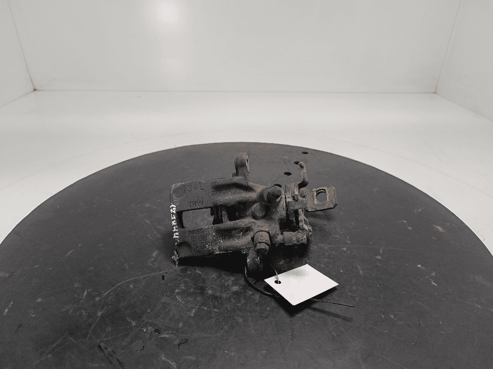 Суппорт задний левый к Nissan  Almera N16 Рестайлинг (03-06)