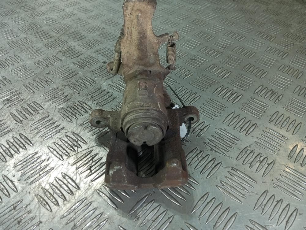 Суппорт задний правый к Nissan  Almera N16 Рестайлинг (03-06)