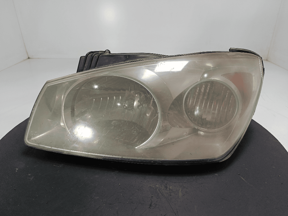 Фара левая к Kia Cerato 1 (03-06)