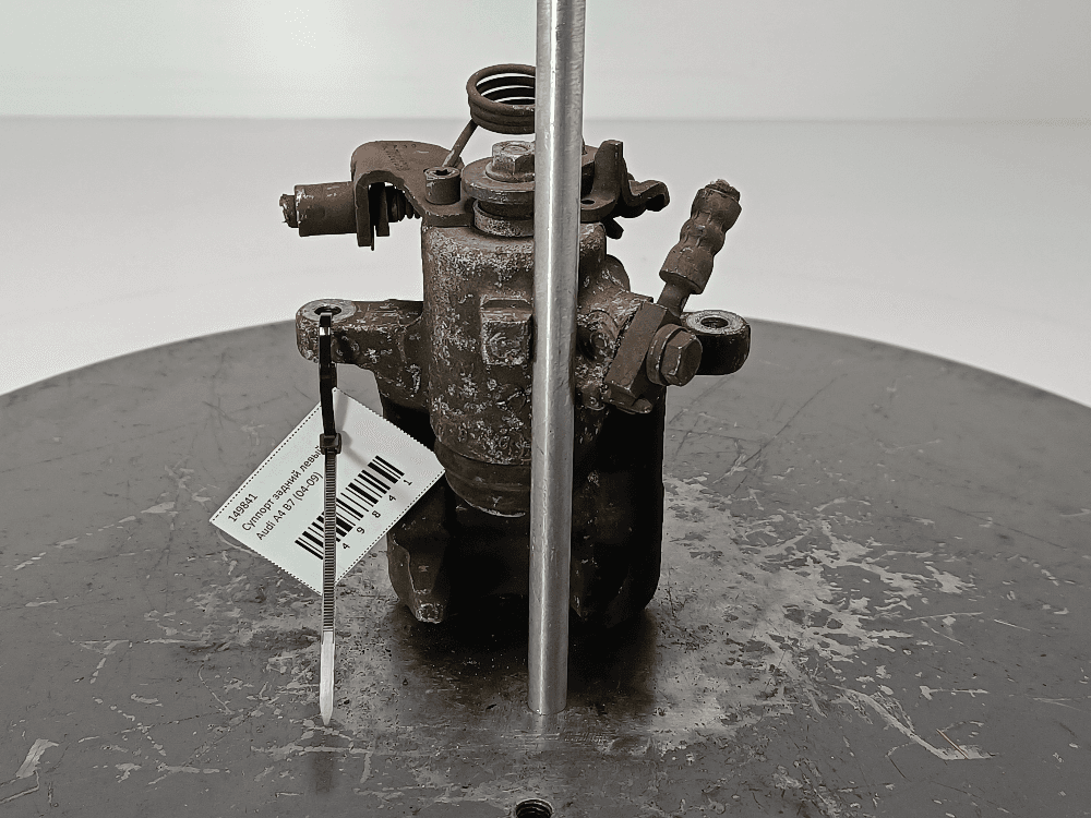 Суппорт задний левый к Audi A4 B7 (04-09)