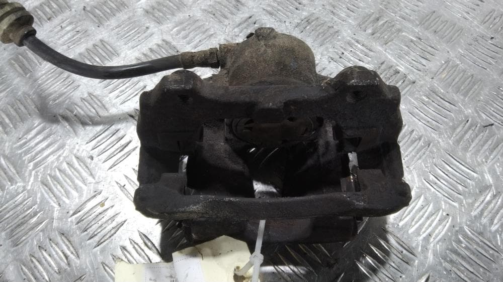 Суппорт передний левый к Opel Corsa D (06-11)