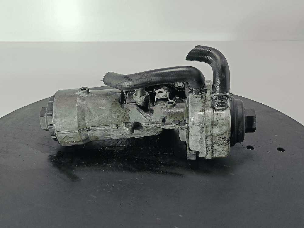 Корпус масляного фильтра к Volkswagen Passat B6 (05-10)