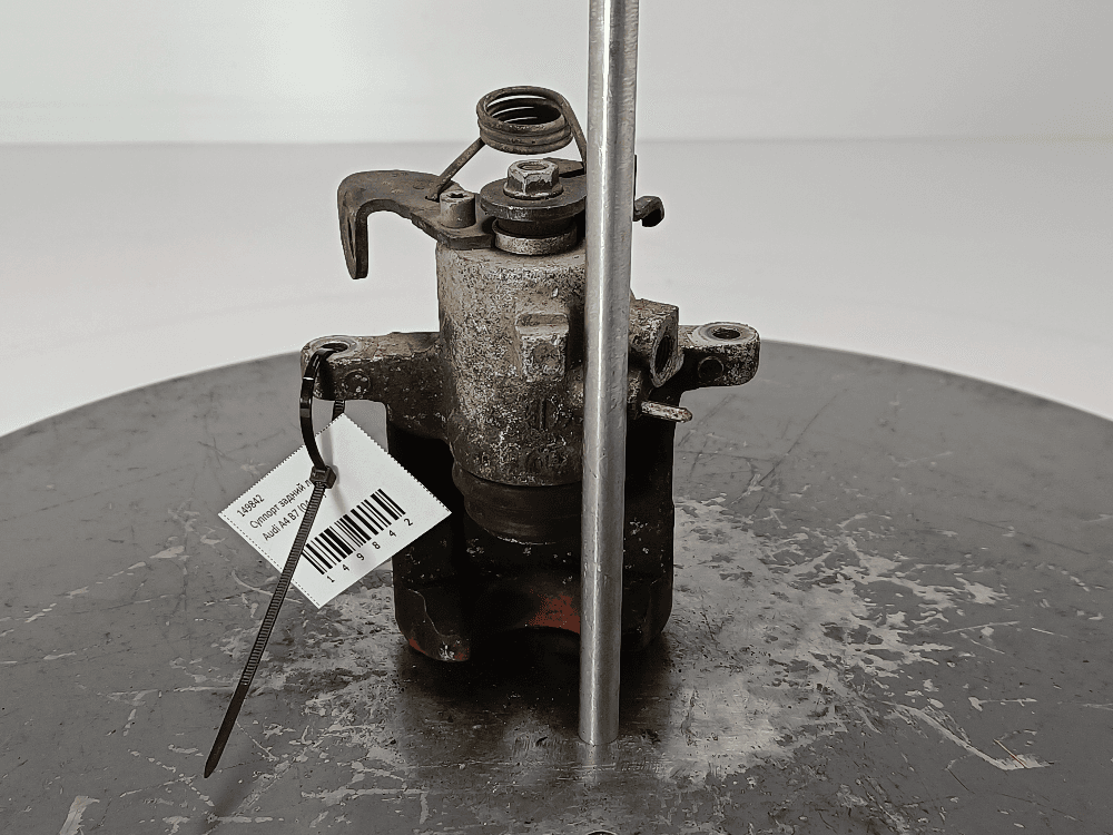 Суппорт задний левый к Audi A4 B7 (04-09)