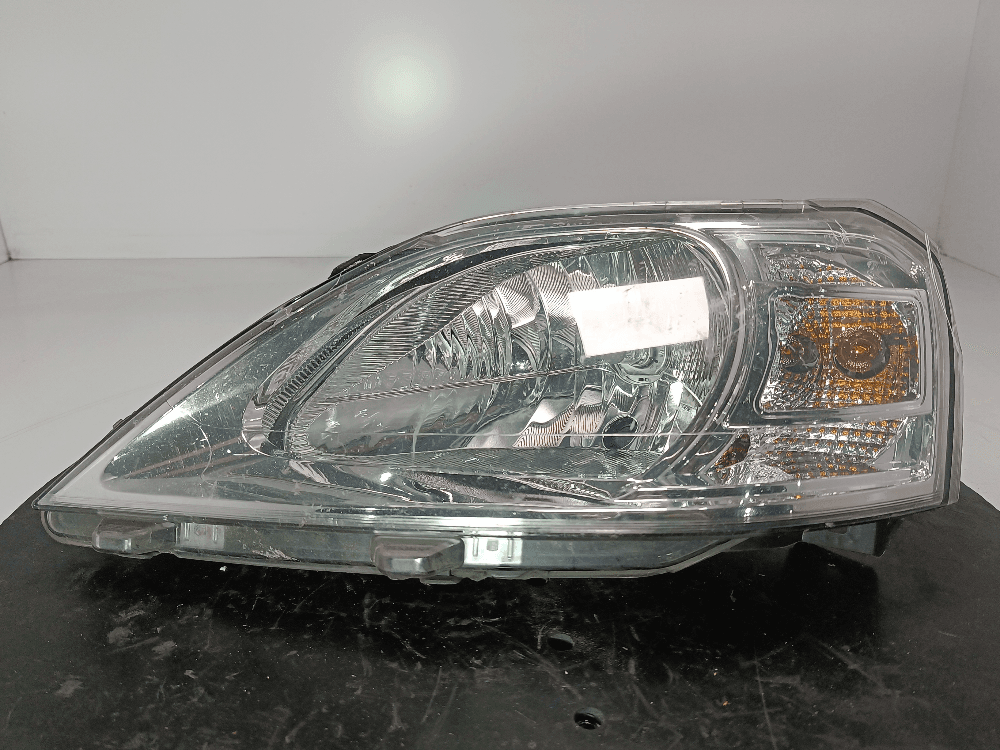Фара левая к Renault Logan 1 (04-09)