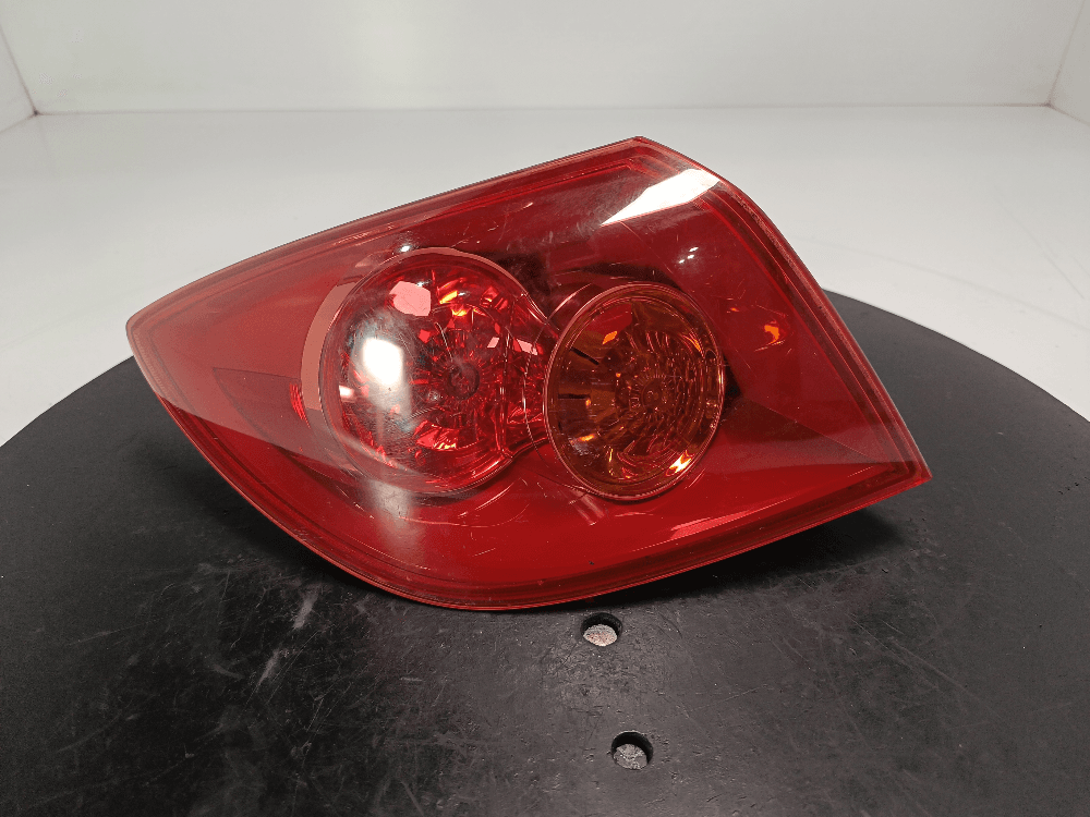Фонарь задний левый к Mazda 3 BK (03-06)