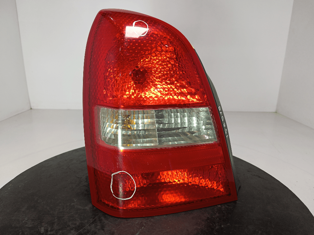 Фонарь задний левый к Nissan  Primera P12 (02-08)