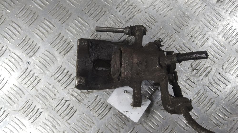 Суппорт задний правый к Mini Cooper R56 (06-10)