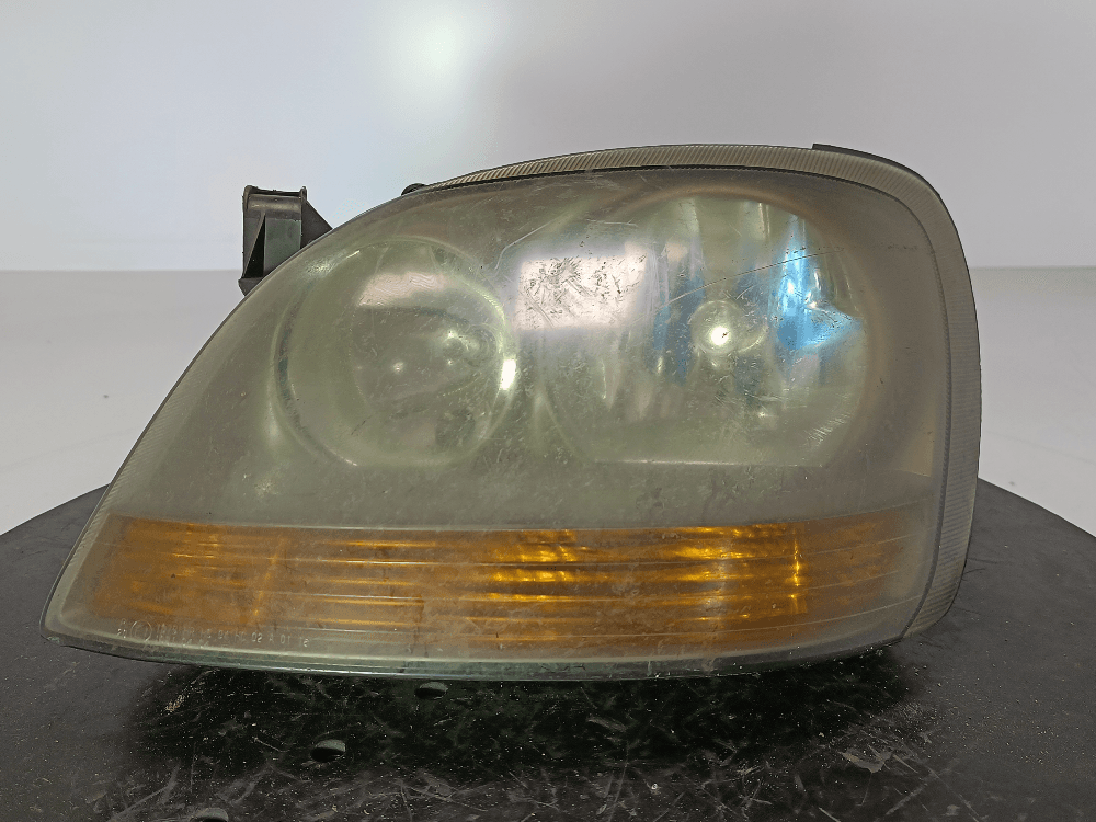 Фара левая к Nissan  Almera Tino (00-06)