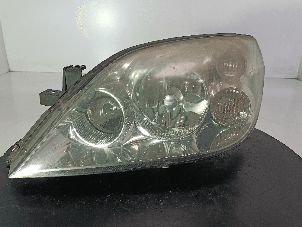 Фара левая к Nissan  Primera P12 (02-08)