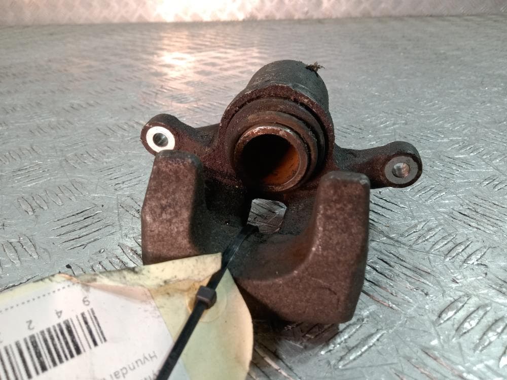 Суппорт задний левый к Hyundai ix35 1 (10-13)