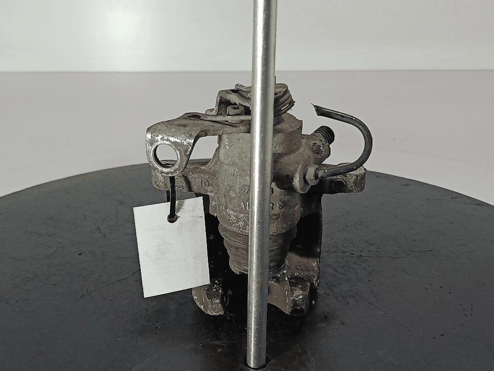 Суппорт задний левый к Peugeot 307 (01-05)