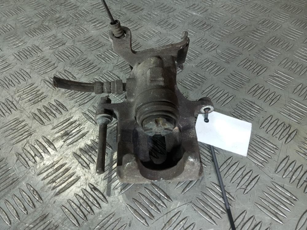 Суппорт задний правый к Ford Focus 1 (98-01)