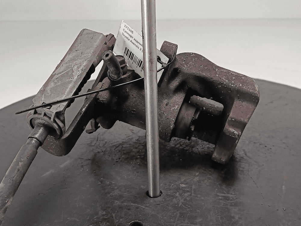 Суппорт задний левый к Toyota Avensis 3 (09-11)