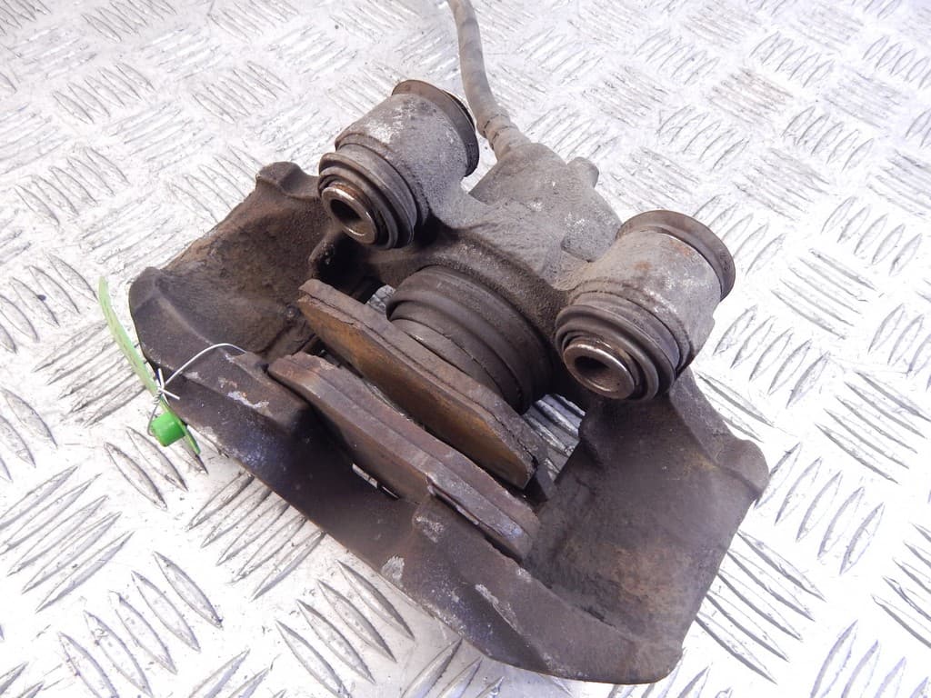 Суппорт передний левый к Renault 19 2 (92-00)