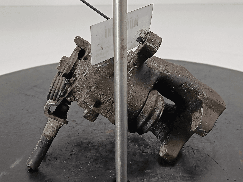 Суппорт задний левый к Opel Zafira B (05-10)