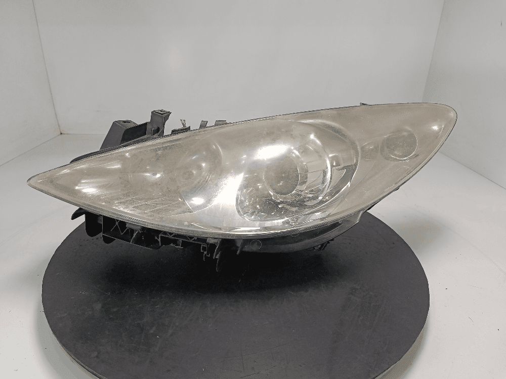 Фара левая к Peugeot 307 Рестайлинг (05-08)