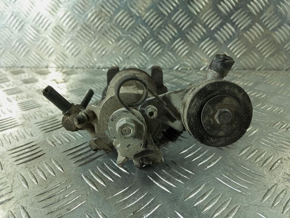 Суппорт задний левый к Opel Astra G (98-04)