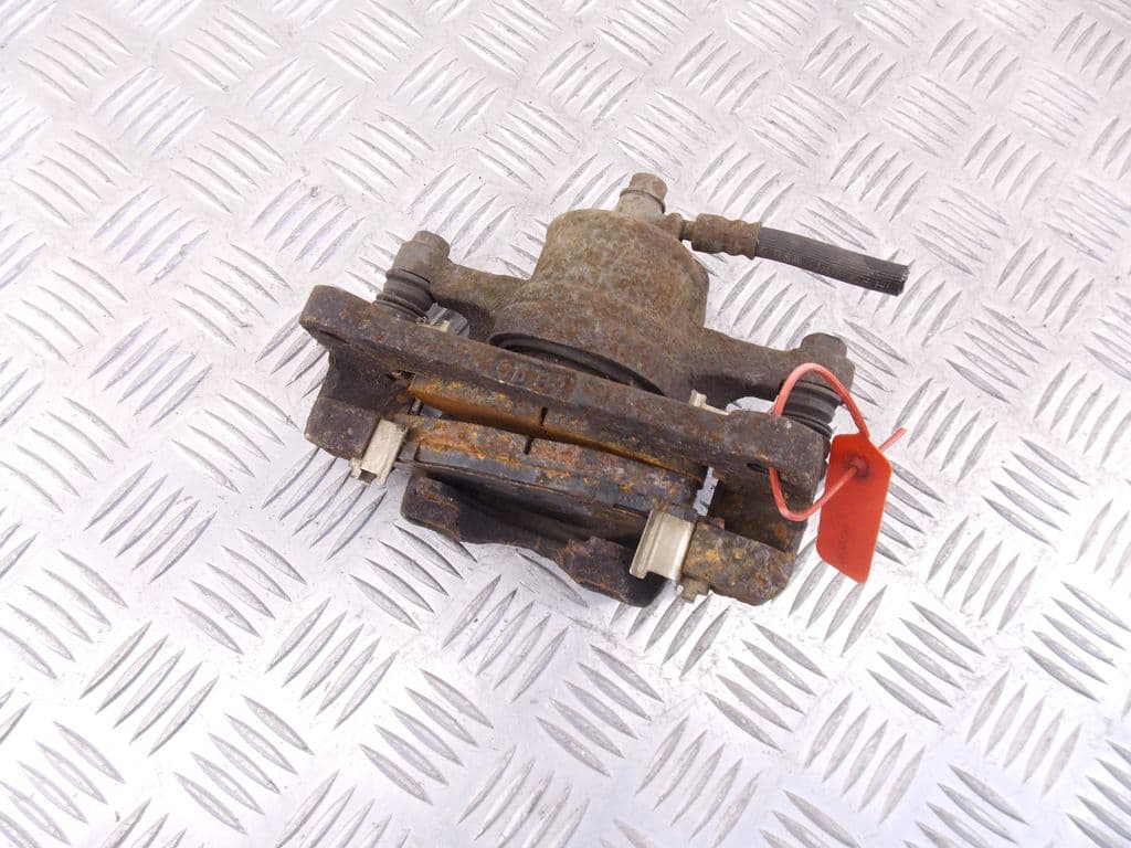 Суппорт передний правый к Chevrolet Spark M200 (05-10)