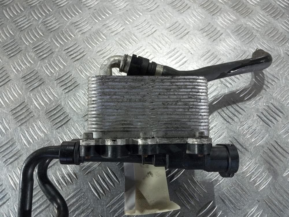 Теплообменник масляного фильтра к BMW 1 E81/E82/E87/E88 (04-07)