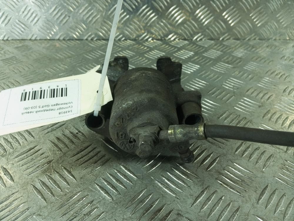 Суппорт передний левый к Volkswagen Golf 5 (03-09)