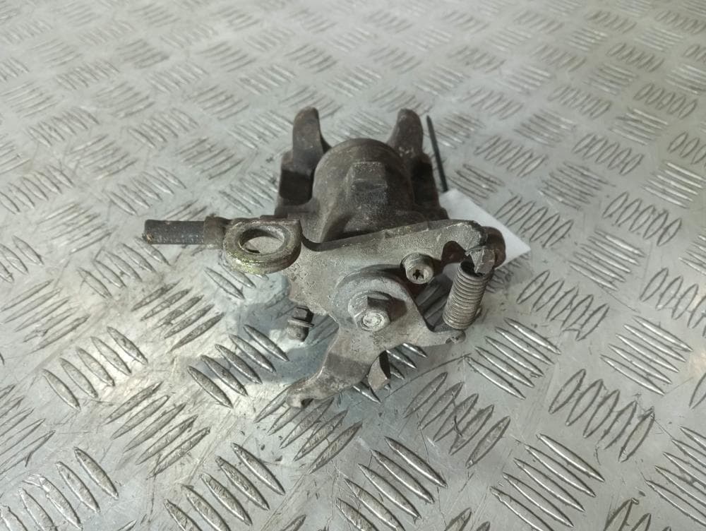 Суппорт задний левый к Ford Focus 1 (98-01)