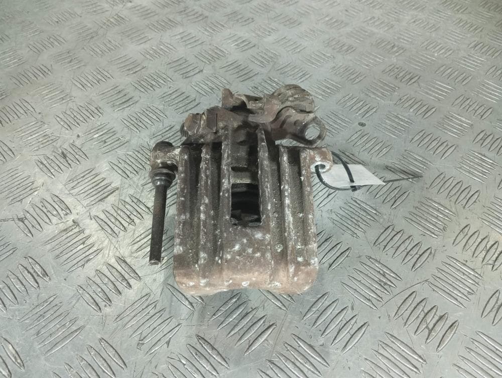 Суппорт задний левый к Volkswagen Golf 4 (97-06)