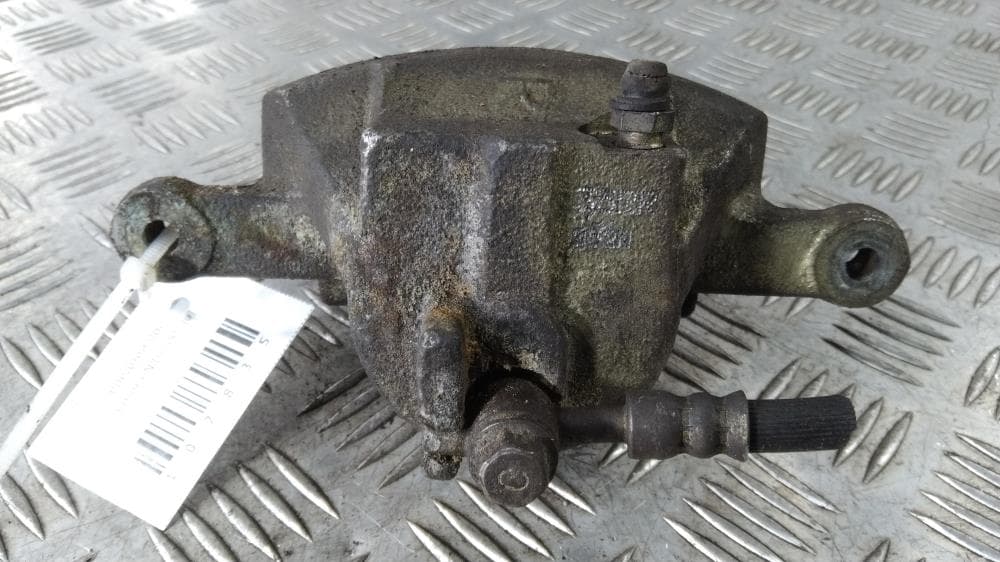 Суппорт передний правый к Nissan  Almera N16 Рестайлинг (03-06)