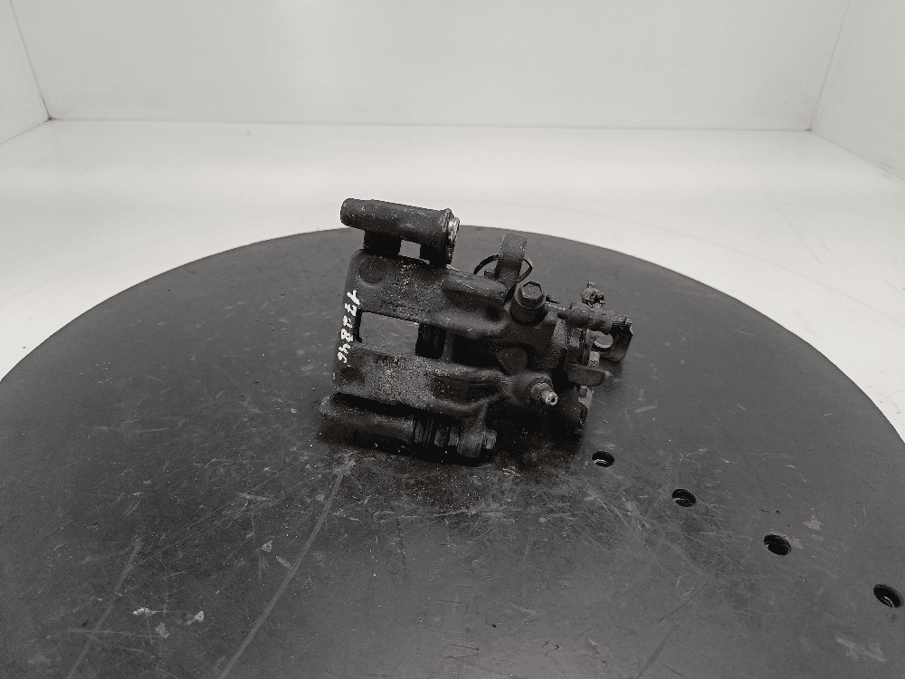 Суппорт задний правый к Nissan  Almera N16 Рестайлинг (03-06)