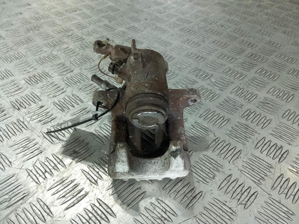 Суппорт задний левый к Volkswagen Golf 5 (03-09)