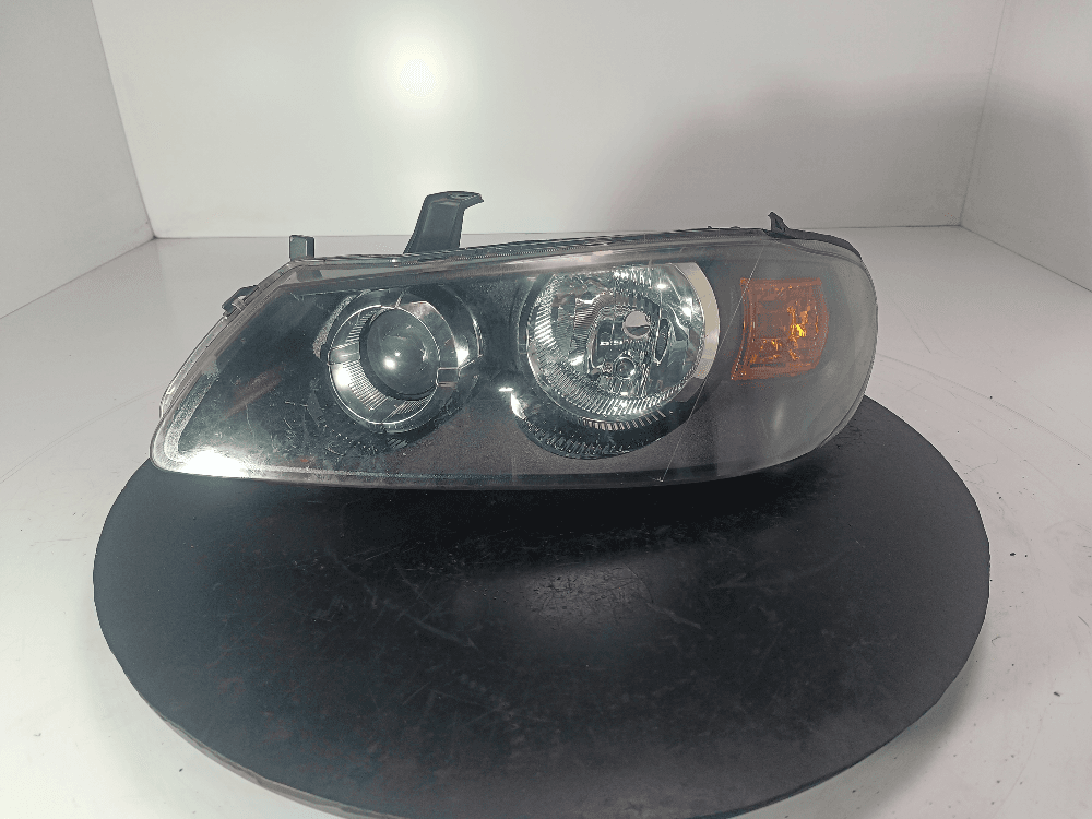 Фара левая к Nissan  Almera N16 (00-03)