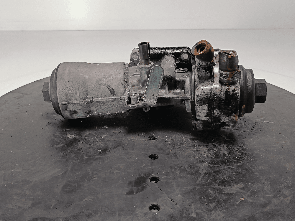 Корпус масляного фильтра к Volkswagen Golf 5 (03-09)