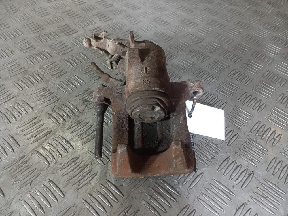 Суппорт задний левый к Volkswagen Golf 5 (03-09)