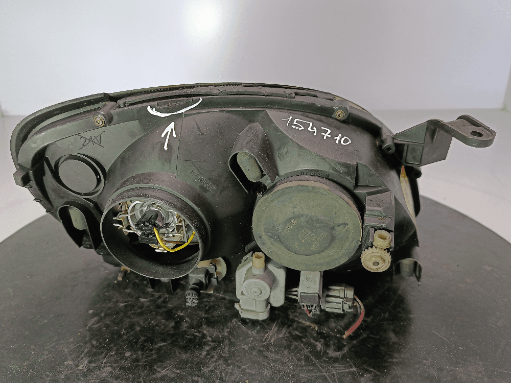 Фара левая к Nissan  Almera Tino (00-06)